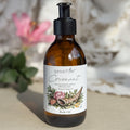 Body oil by Gesalfde in a glass pump bottle, promoting skin nourishment and self-care.