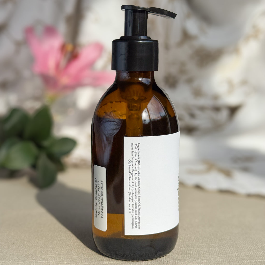 Body oil by Gesalfde in a glass pump bottle, promoting skin nourishment and self-care.