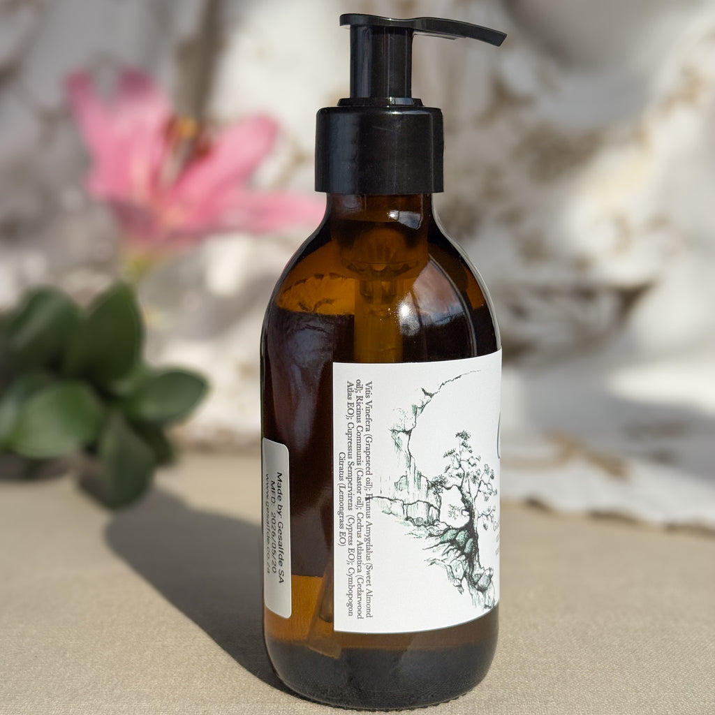 Body oil by Gesalfde in a glass pump bottle for men, promoting skin nourishment and self-care.