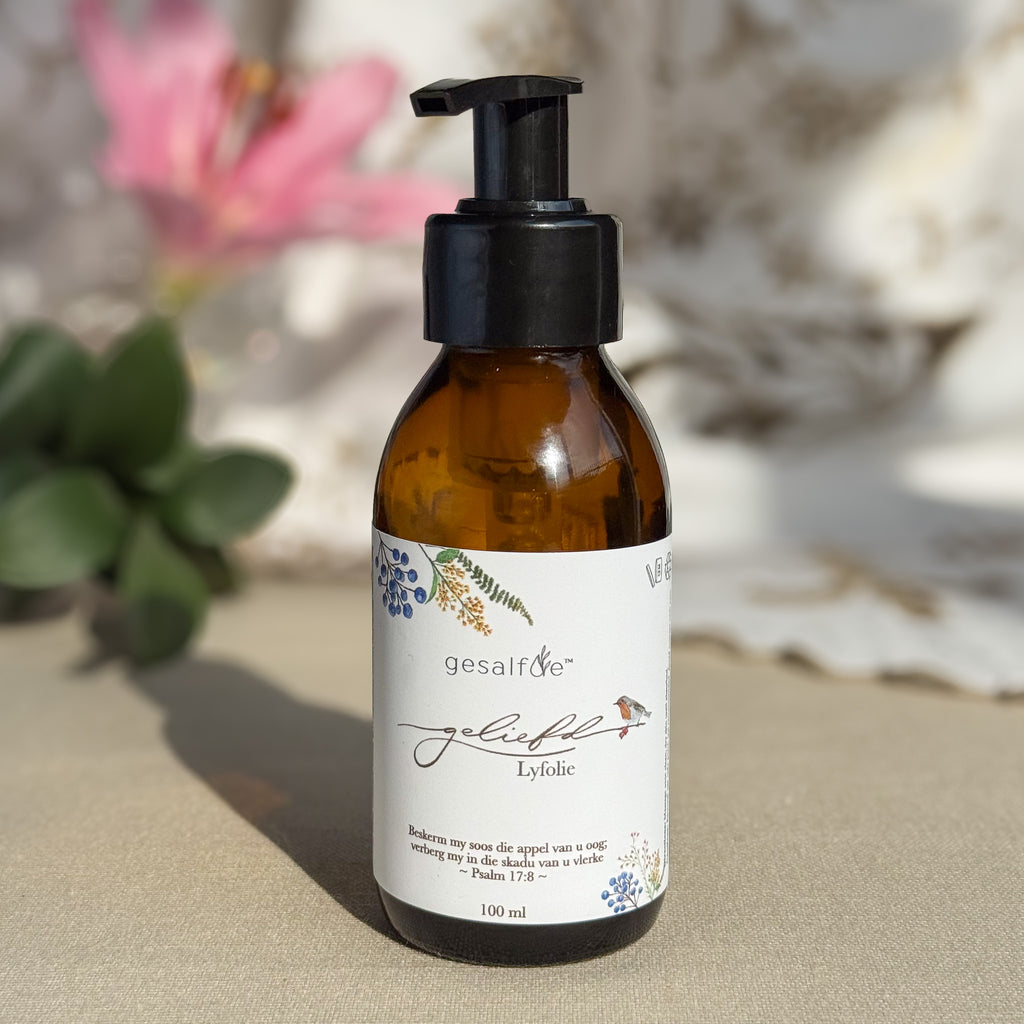 Body oil by Gesalfde in a glass pump bottle, promoting skin nourishment and self-care.