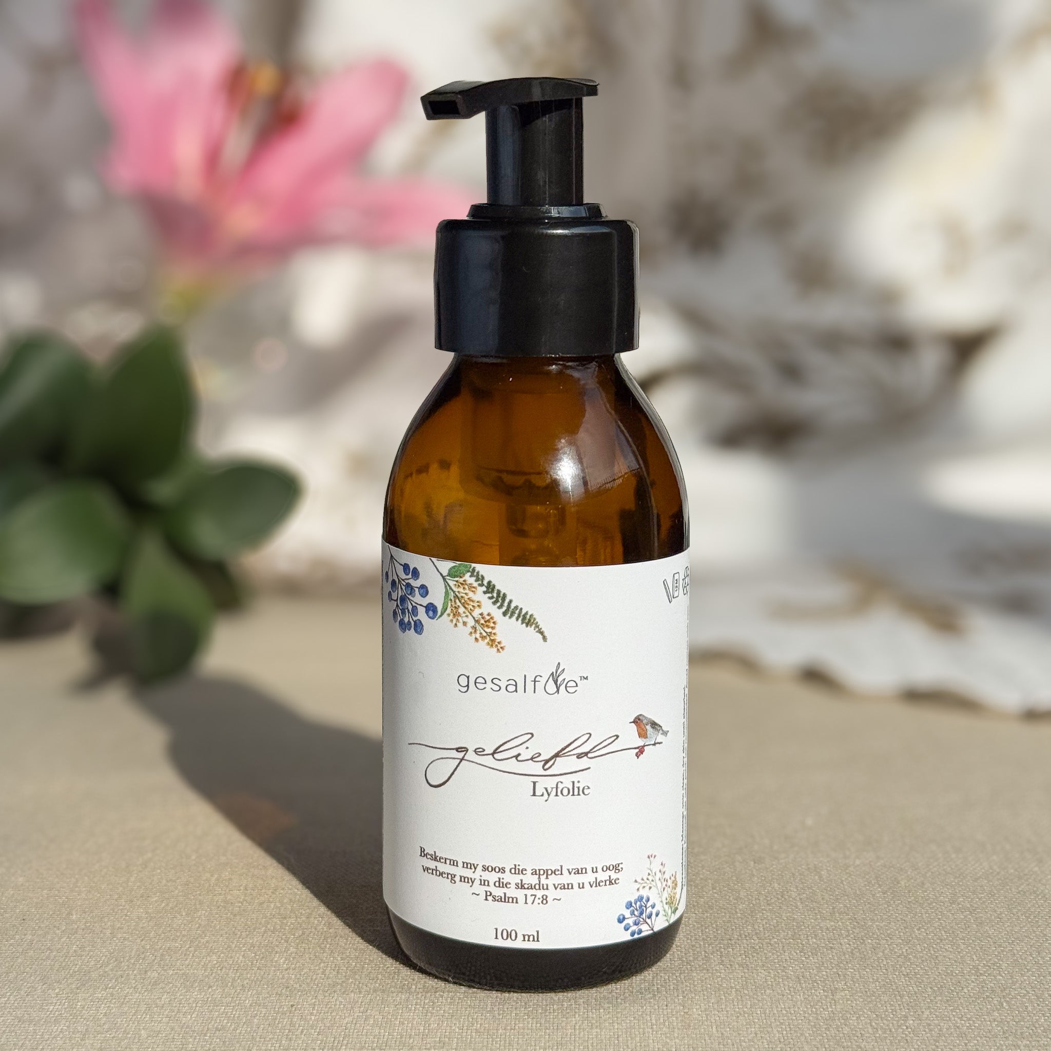 Body oil by Gesalfde in a glass pump bottle, promoting skin nourishment and self-care.