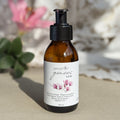 Body oil by Gesalfde in a glass pump bottle, promoting skin nourishment and self-care.