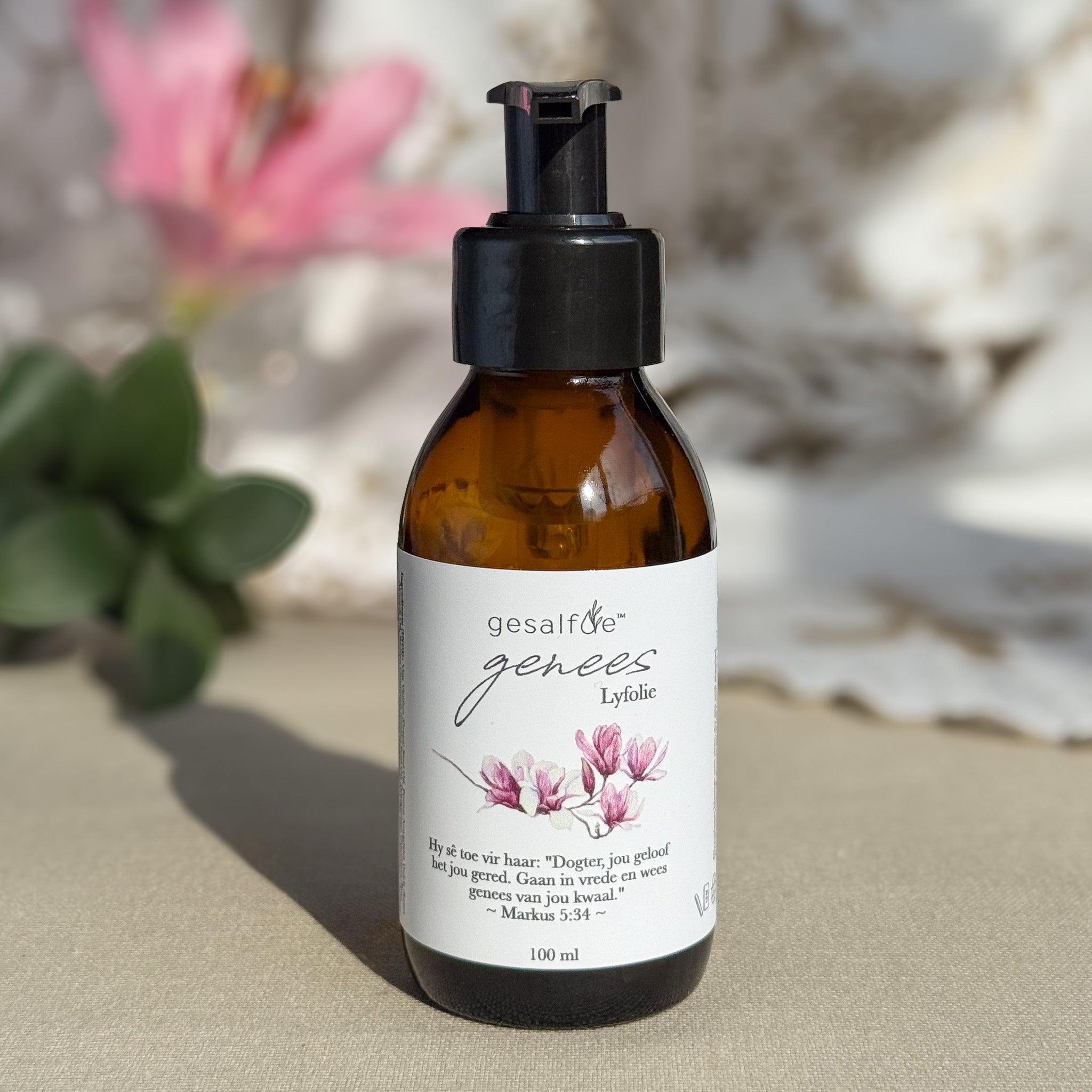 Body oil by Gesalfde in a glass pump bottle, promoting skin nourishment and self-care.