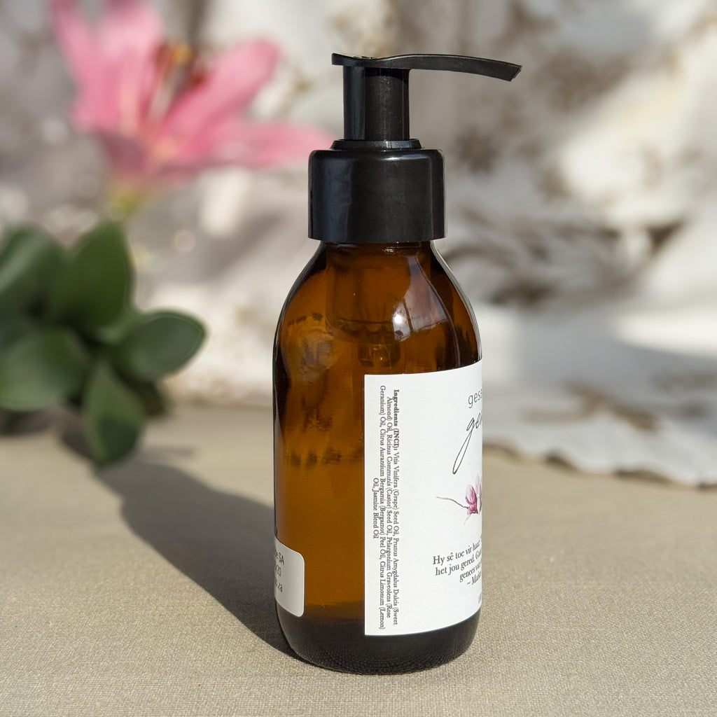 Body oil by Gesalfde in a glass pump bottle, promoting skin nourishment and self-care.