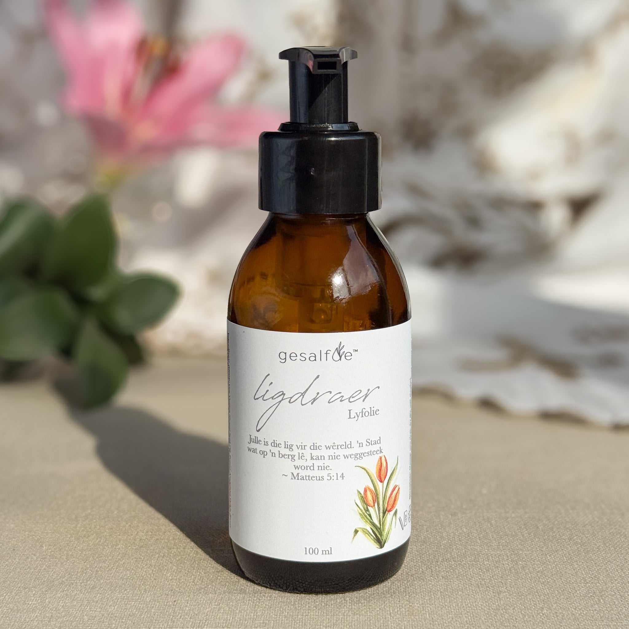 Body oil by Gesalfde in a glass pump bottle, promoting skin nourishment and self-care.