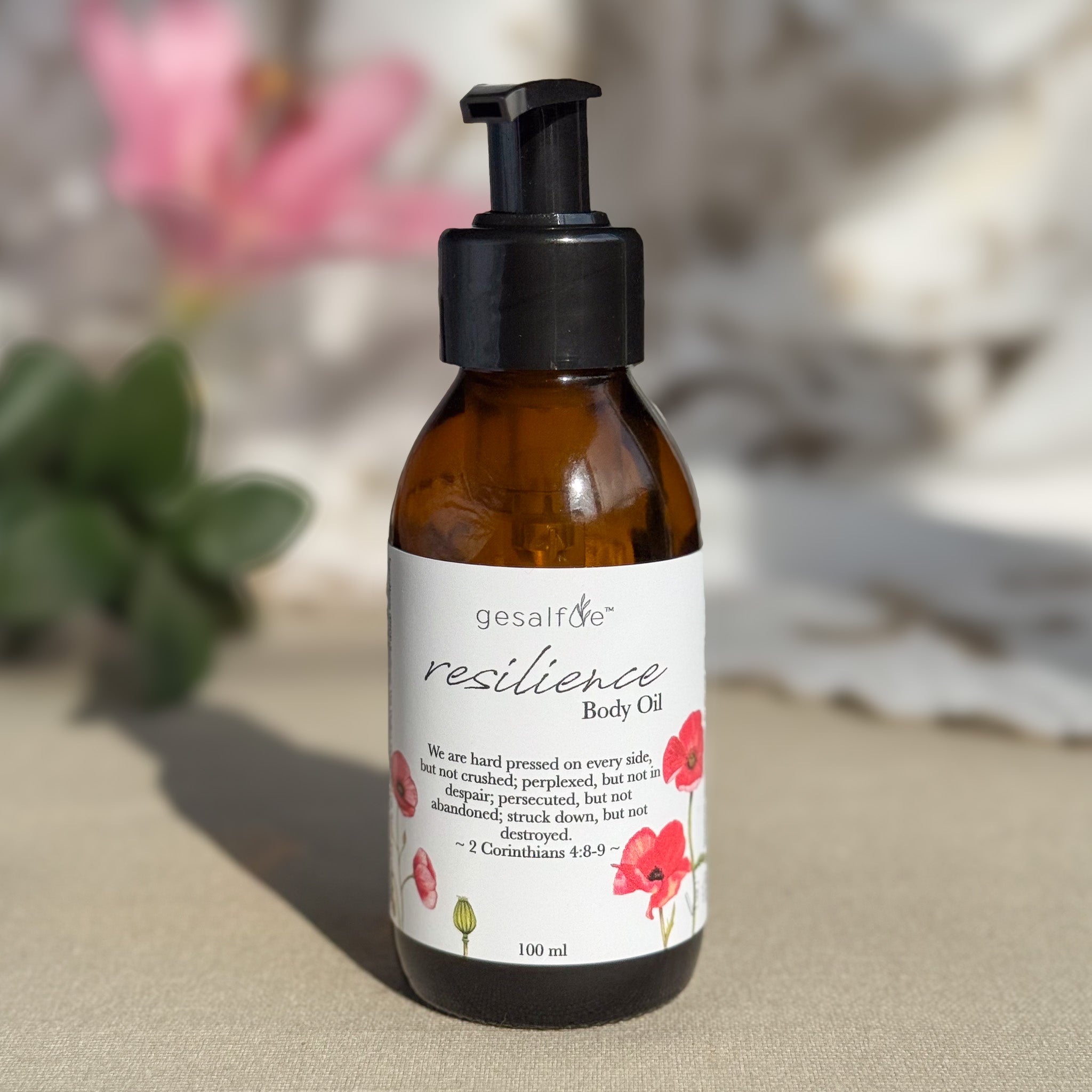 Body oil by Gesalfde in a glass pump bottle, promoting skin nourishment and self-care.