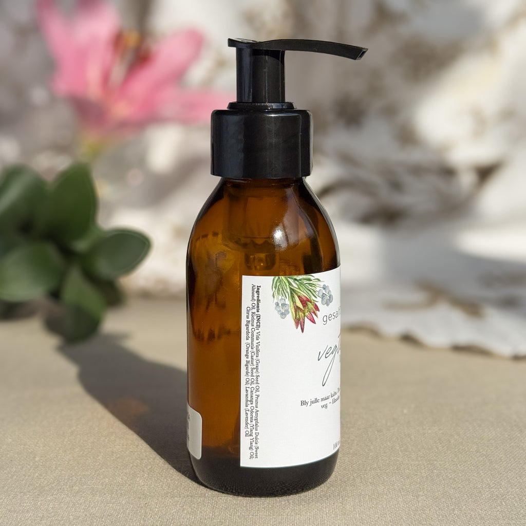 Body oil by Gesalfde in a glass pump bottle, promoting skin nourishment and self-care.