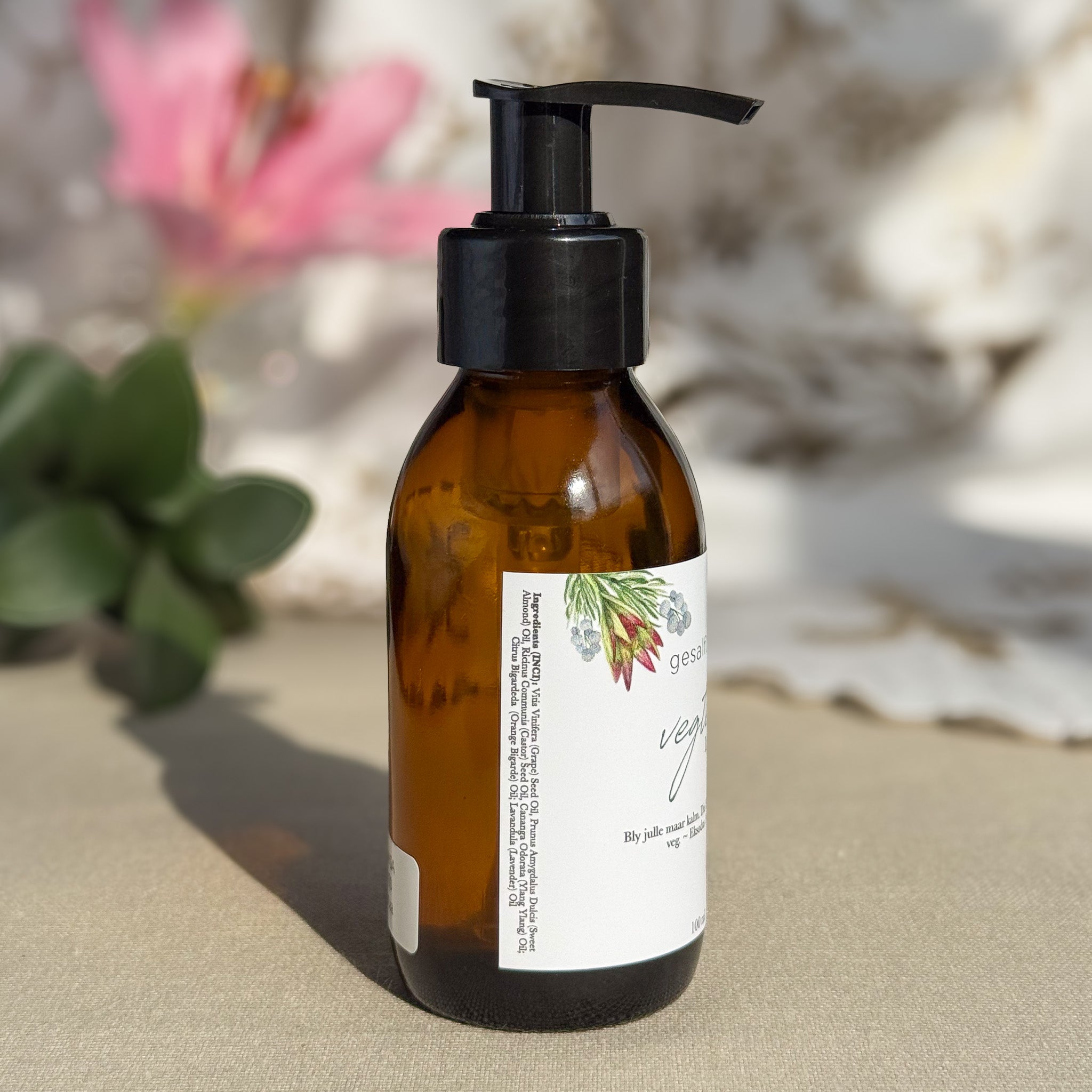 Body oil by Gesalfde in a glass pump bottle, promoting skin nourishment and self-care.