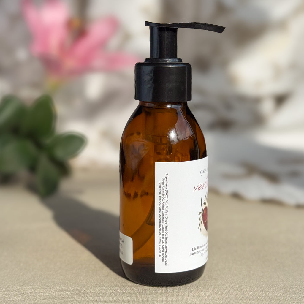 Body oil by Gesalfde in a glass pump bottle, promoting skin nourishment and self-care.