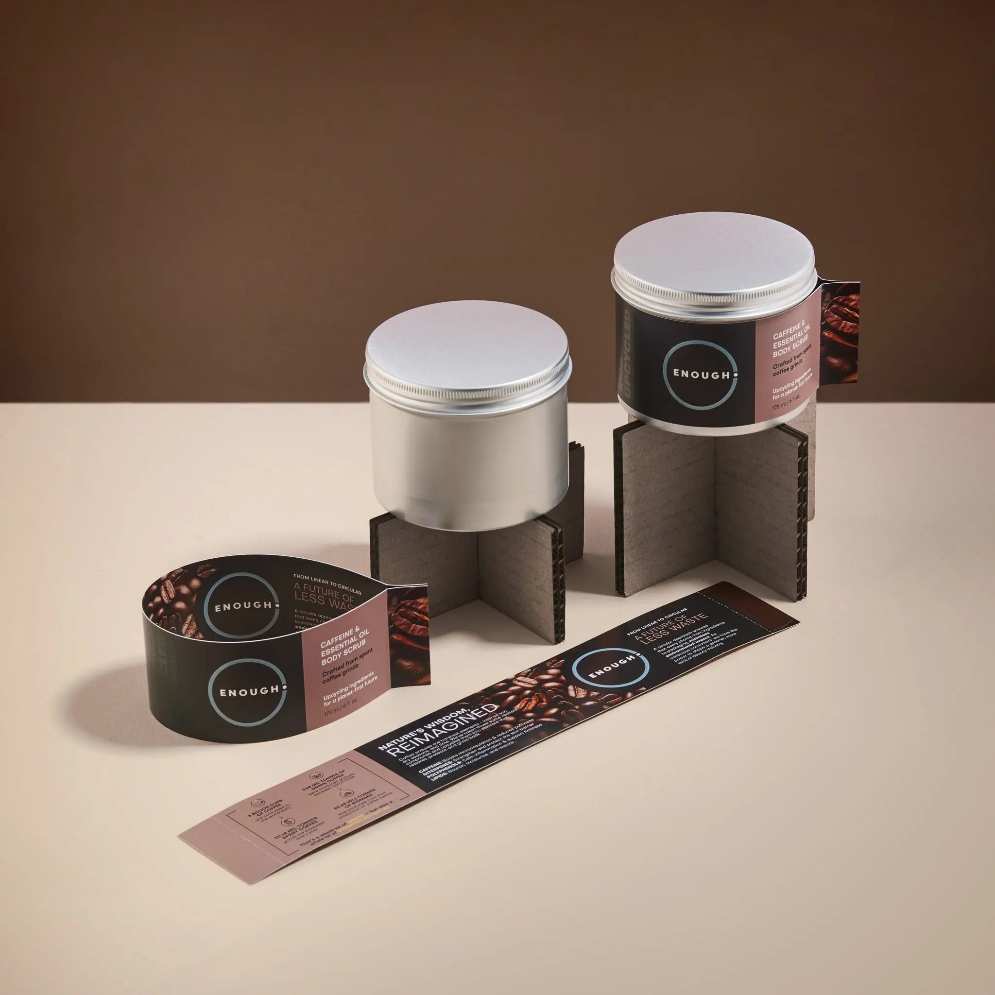 Reusable containers of ENOUGH caffeine and essential oil body scrub 