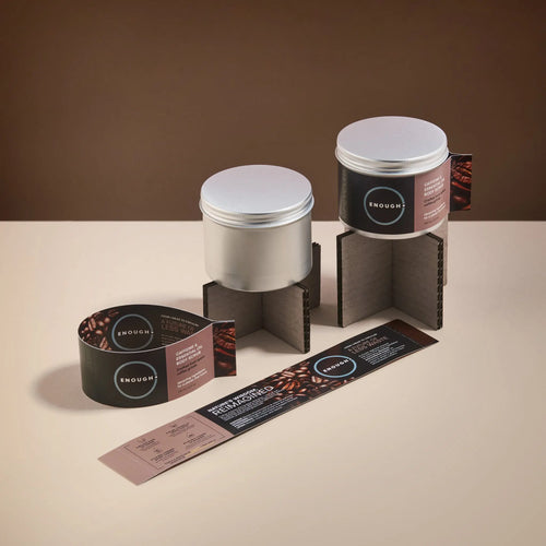 Reusable containers of ENOUGH caffeine and essential oil body scrub 