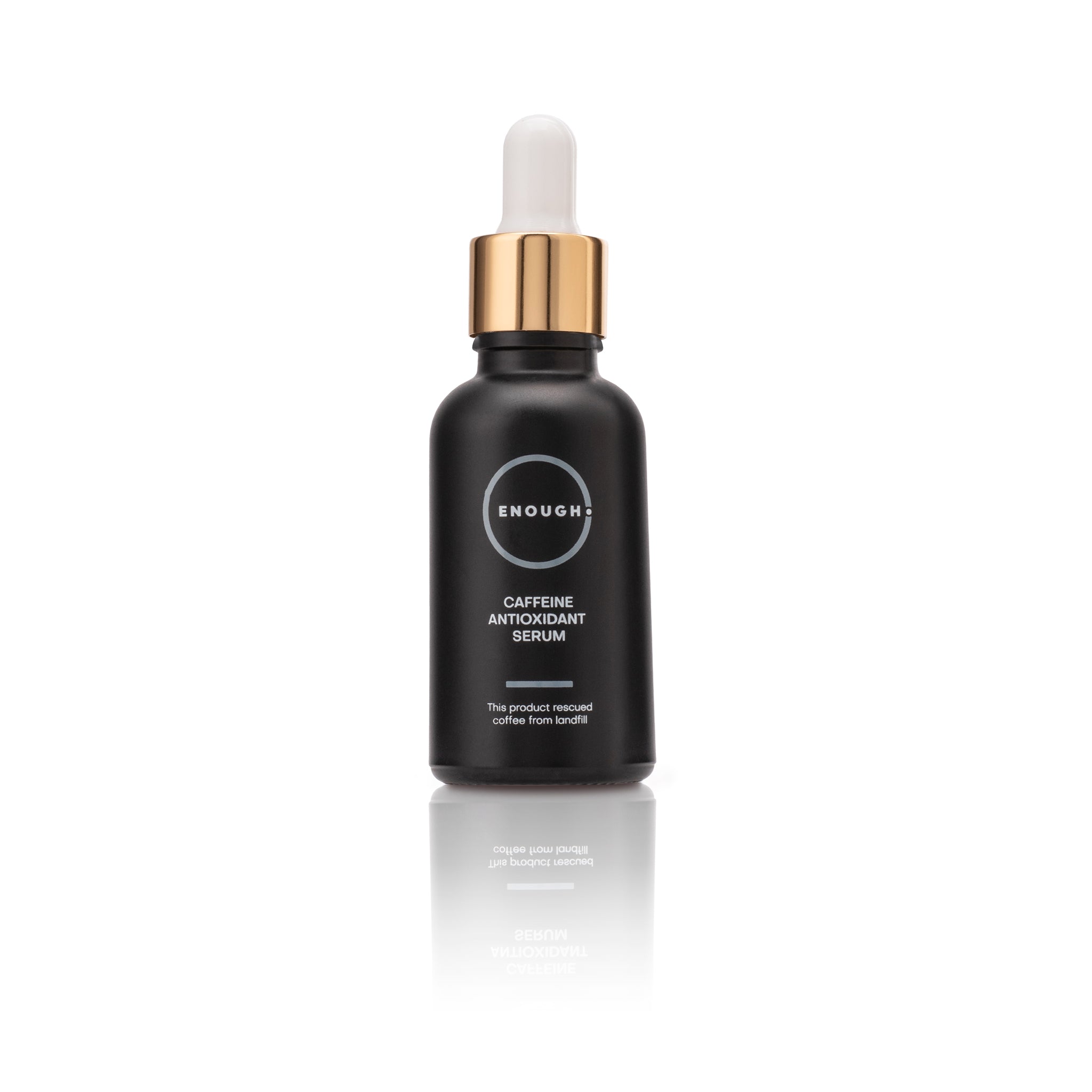 Black serum bottle with gold cap containing Caffeine Antioxidant serum on a white background