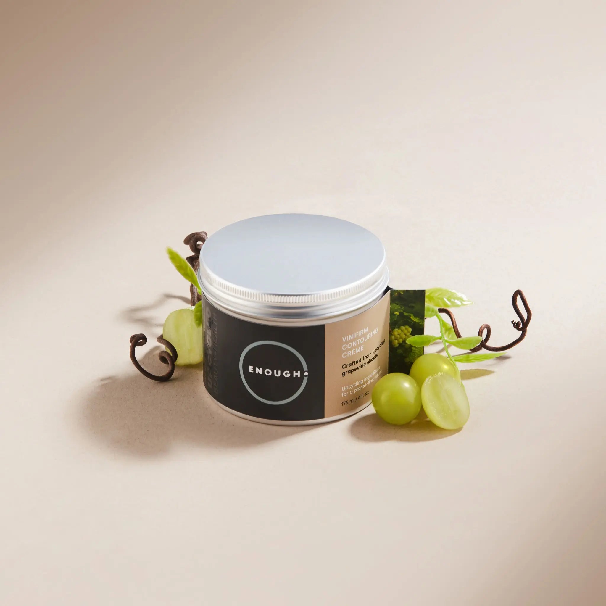 Cosmetic reusable container containing 'ENOUGH' Vinifirm Contouring Crème on a white background